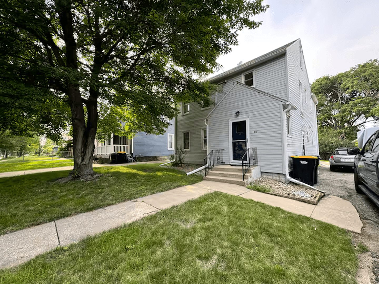 Exterior view of Kutzky Duplex and the lower-home entrance