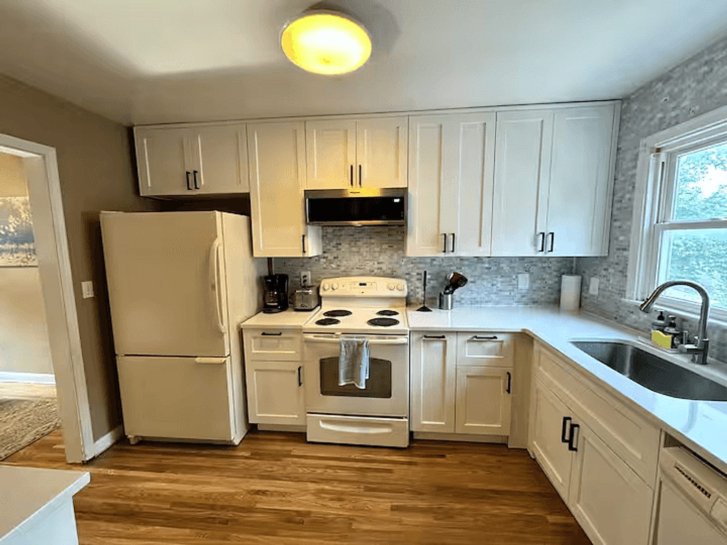 Upper-home kitchen cabinetry, counters, and appliances