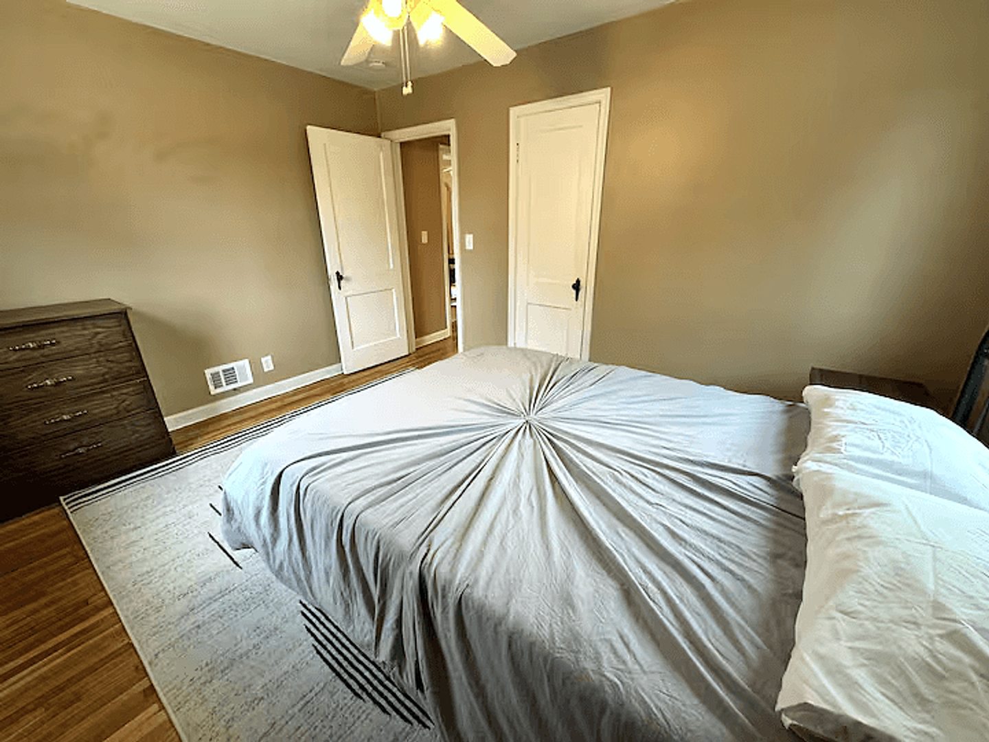 Second view of the upper home's second queen bedroom
