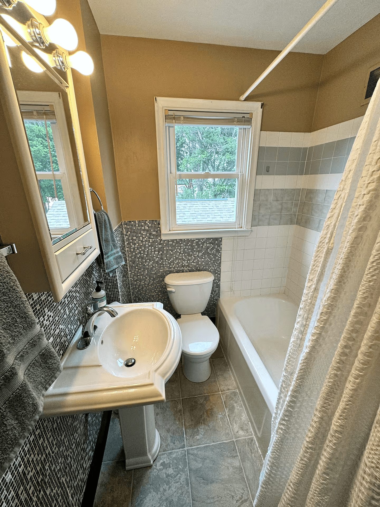Updated full bathroom in the upper home
