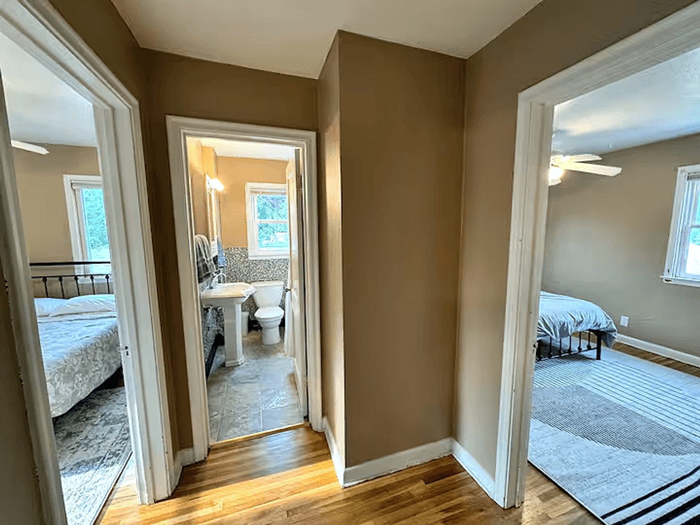 Upper-home hallway connecting the bedrooms and bathroom