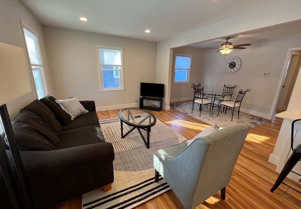 Open living and dining room in the lower duplex home
